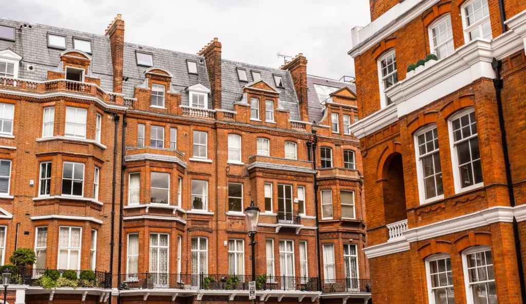 Homeowner weighing options between one or two Party Wall Surveyors Brighton and Hove